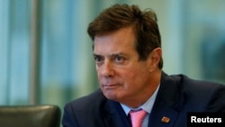 U.S. -- Paul Manafort of Republican presidential nominee Donald Trump's staff listens during a round table discussion on security at Trump Tower in the Manhattan borough of New York, August 17, 2016