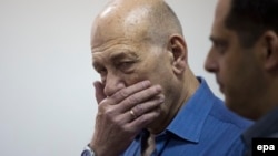 Ehud Olmert (solda)