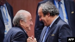 Sepp Blatter və Michel Platini 