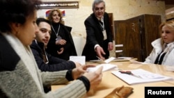 Armenia -- Election officials count ballots after polls closed at a polling station in Yerevan, 18Feb2013