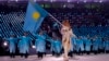 SOUTH KOREA -- Abzal Azhgaliev of Kazakhstan carries the national flag during the Olympic Opening ceremony reception in Pyeongchang, February 9, 2018