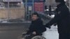 Kazakhstan - Disabled activist Asanali Suiubayev is taken by police. Aktobe, 22 February 2020