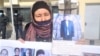 Kazakhstan – A Kazakh woman Gulzat Ermekbai / Yermekbai is standing at picket of Chinese consulate for release of Xinjiang relatives. Almaty, 26 February 2021